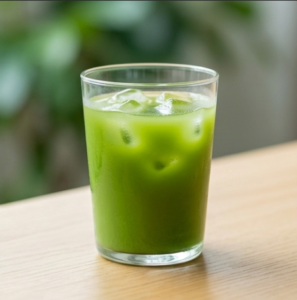 Refreshing iced cold brew matcha tea in a glass, displaying a clear and vibrant green color perfect for daily drinking.