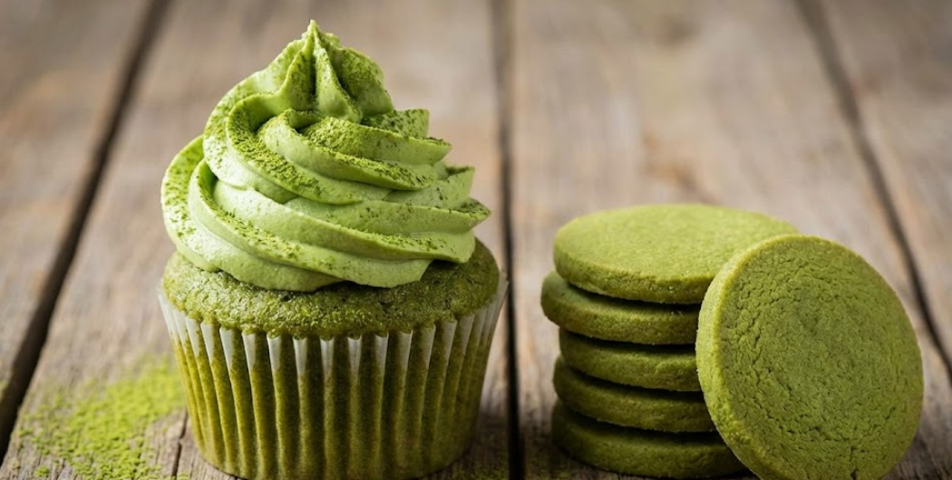 A close-up of a matcha-colored baked good like a cookie or cake