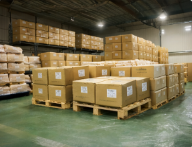 Packed matcha products ready for dispatch in a warehouse
