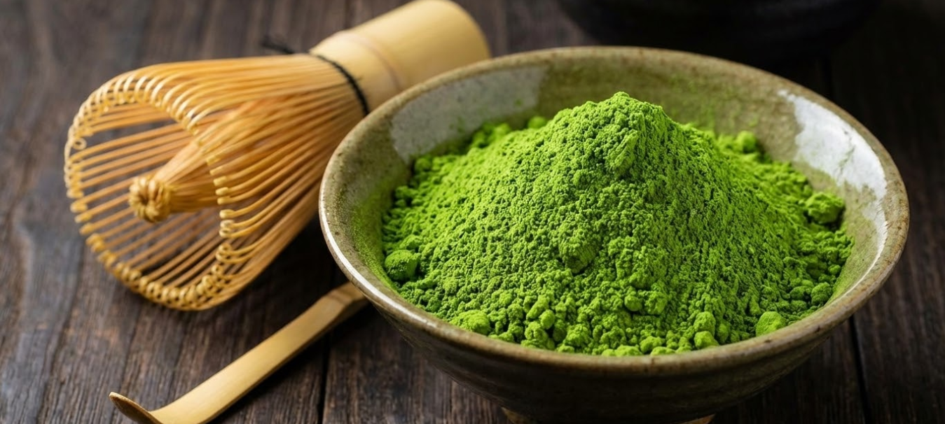 A close-up shot of vibrant, emerald green matcha powder